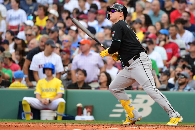 Aug 24, 2024; Boston, Massachusetts, USA;  Arizona Diamondbacks designated hitter Joc Pederson (3) hits a double off the center field wall during the fourth inning against the Boston Red Sox at Fenway Park. Mandatory Credit: Bob DeChiara-USA TODAY Sports
