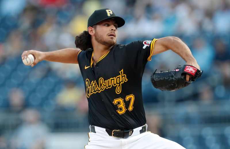 May 22, 2024; Pittsburgh, Pennsylvania, USA;  Pittsburgh Pirates starting pitcher Jared Jones (37) pitches against the San Francisco Giants during the second inning at PNC Park. Mandatory Credit: Charles LeClaire-USA TODAY Sports