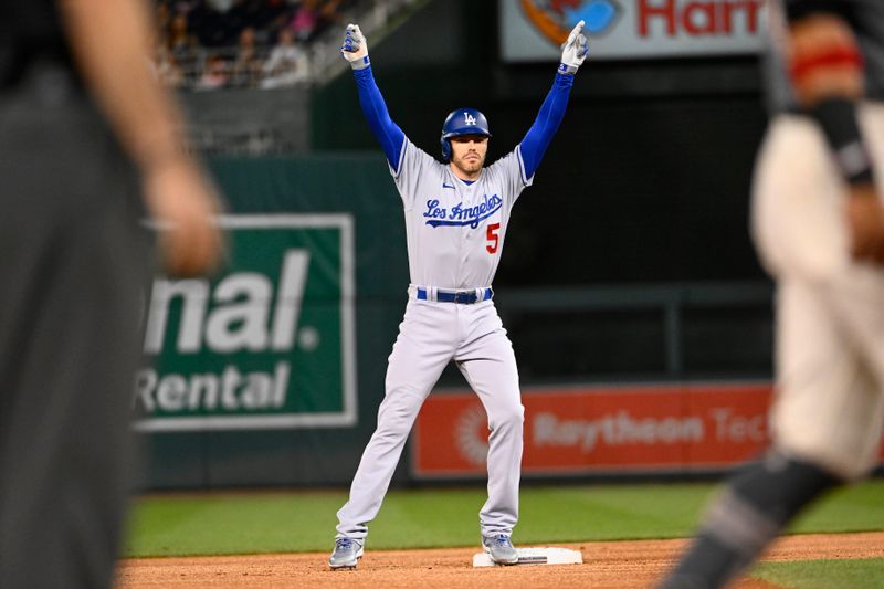 Sep 9, 2023; Washington, District of Columbia, USA; Los Angeles Dodgers first baseman Freddie Freeman (5) reacts after hitting a double against the Washington Nationals during the first inning at Nationals Park. Mandatory Credit: Brad Mills-USA TODAY Sports