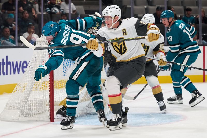 Sep 26, 2025; San Jose, California, USA; Vegas Golden Knights defenseman Kaedan Korczak (6) defends the goal crease against San Jose Sharks right wing Carl Grundstrom (91) during the second period at SAP Center at San Jose. Mandatory Credit: Robert Edwards-Imagn Images