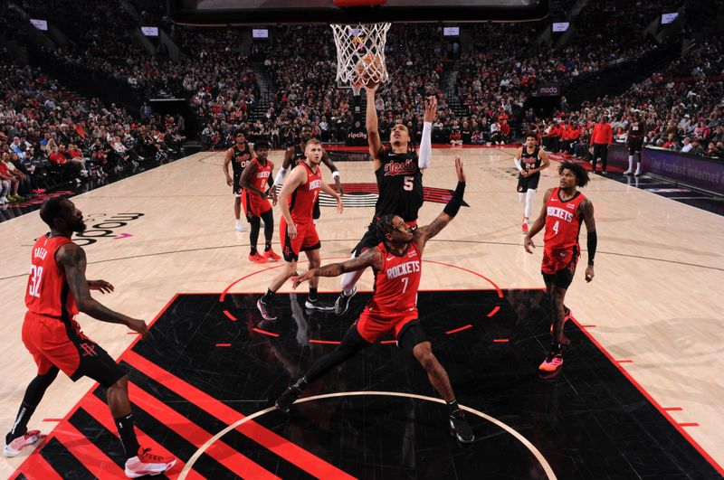 PORTLAND, OR - APRIL 12: Dalano Banton #5 of the Portland Trail Blazers shoots the ball during the game against the Houston Rockets on April 12, 2024 at the Moda Center Arena in Portland, Oregon. NOTE TO USER: User expressly acknowledges and agrees that, by downloading and or using this photograph, user is consenting to the terms and conditions of the Getty Images License Agreement. Mandatory Copyright Notice: Copyright 2024 NBAE (Photo by Cameron Browne/NBAE via Getty Images)