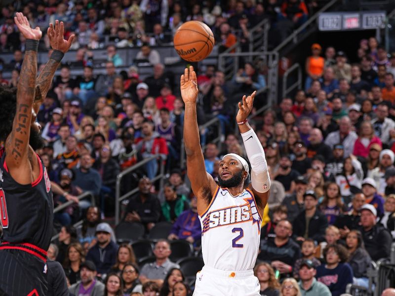 PHOENIX, AZ - JANUARY 22: Josh Okogie #2 of the Phoenix Suns shoots the ball during the game against the Chicago Bulls on January 22, 2024 at Footprint Center in Phoenix, Arizona. NOTE TO USER: User expressly acknowledges and agrees that, by downloading and or using this photograph, user is consenting to the terms and conditions of the Getty Images License Agreement. Mandatory Copyright Notice: Copyright 2024 NBAE (Photo by Garrett Ellwood/NBAE via Getty Images)