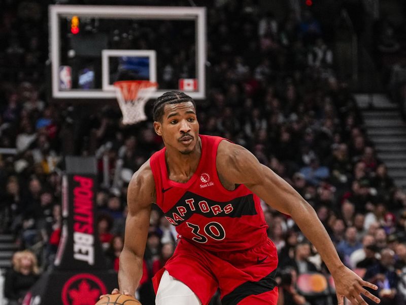 TORONTO, ON - DECEMBER 1: Ochai Agbaji #30 of the Toronto Raptors dribbles against the Miami Heat at Scotiabank Arena on December 1, 2024 in Toronto, Ontario, Canada. NOTE TO USER: User expressly acknowledges and agrees that, by downloading and/or using this Photograph, user is consenting to the terms and conditions of the Getty Images License Agreement. (Photo by Andrew Lahodynskyj/Getty Images)