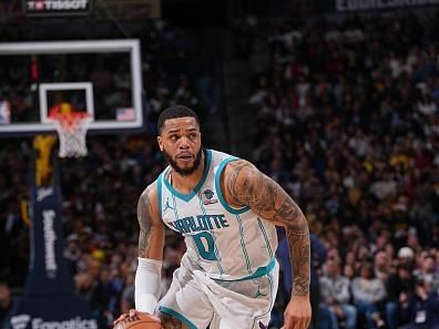 DENVER, CO - JANUARY 1: Miles Bridges #0 of the Charlotte Hornets handles the ball during the game against the Denver Nuggets on January 1, 2024 at the Ball Arena in Denver, Colorado. NOTE TO USER: User expressly acknowledges and agrees that, by downloading and/or using this Photograph, user is consenting to the terms and conditions of the Getty Images License Agreement. Mandatory Copyright Notice: Copyright 2024 NBAE (Photo by Bart Young/NBAE via Getty Images)