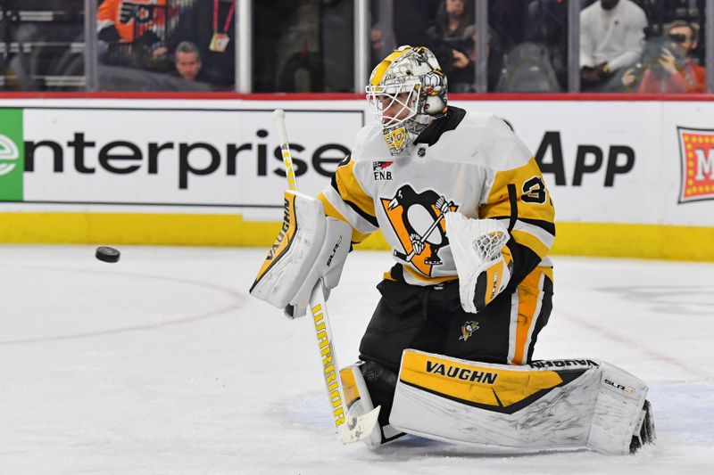 Jan 8, 2024; Philadelphia, Pennsylvania, USA; Pittsburgh Penguins goaltender Alex Nedeljkovic (39) makes a save against the Philadelphia Flyers during the third period at Wells Fargo Center. Mandatory Credit: Eric Hartline-USA TODAY Sports