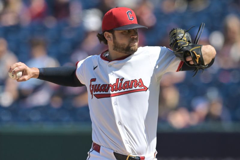 Sep 14, 2025; Cleveland, Ohio, USA; Cleveland Guardians starting pitcher Slade Cecconi (44) throws a pitch against the Chicago White Sox during the first inning at Progressive Field. Mandatory Credit: Ken Blaze-Imagn Images