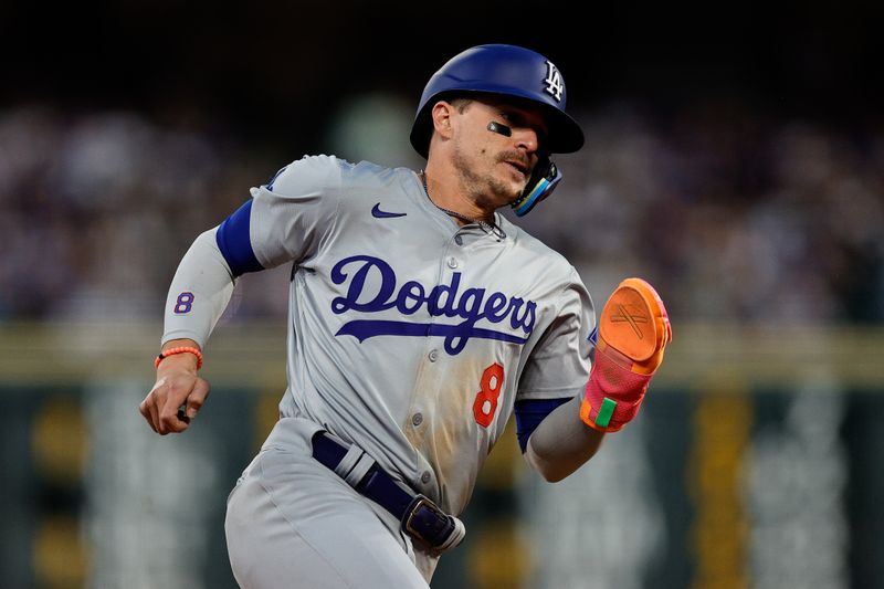 Jun 18, 2024; Denver, Colorado, USA; Los Angeles Dodgers third baseman Kike Hernandez (8) rounds third on an RBI in the seventh inning against the Colorado Rockies at Coors Field. Mandatory Credit: Isaiah J. Downing-USA TODAY Sports