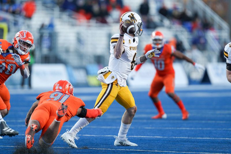 Oct 28, 2023; Boise, Idaho, USA; Wyoming Cowboys quarterback Andrew Peasley (6) throws down field during the second half against the Boise State Broncos at Albertsons Stadium. Mandatory Credit: Brian Losness-USA TODAY Sports