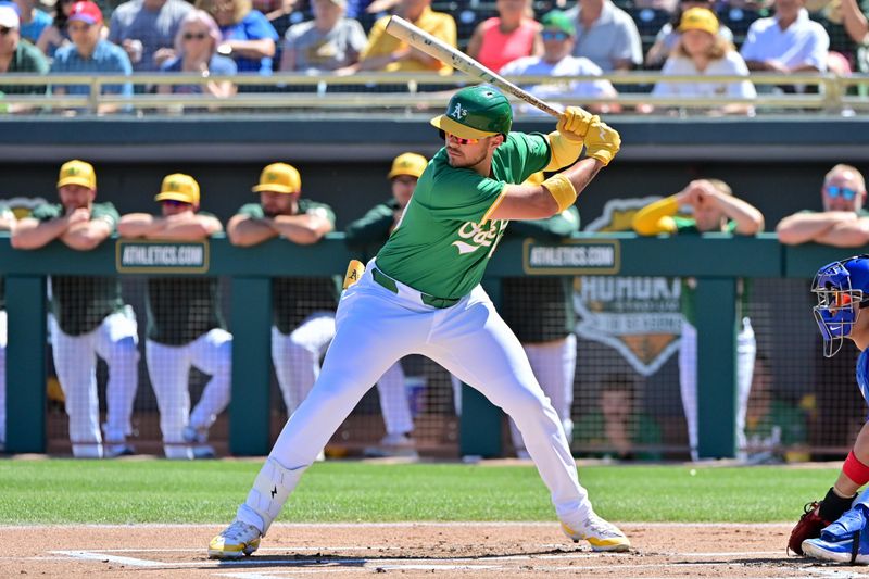 Mar 20, 2024; Mesa, Arizona, USA;  Oakland Athletics first baseman Ryan Noda (49) at bat in the first inning against the Chicago Cubs during a spring training game at Hohokam Stadium. Mandatory Credit: Matt Kartozian-USA TODAY Sports