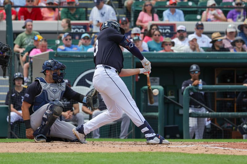 Mar 23, 2024; Lakeland, Florida, USA; Detroit Tigers first baseman Mark Canha (21) bats during the third inning against the New York Yankees at Publix Field at Joker Marchant Stadium. Mandatory Credit: Mike Watters-USA TODAY Sports