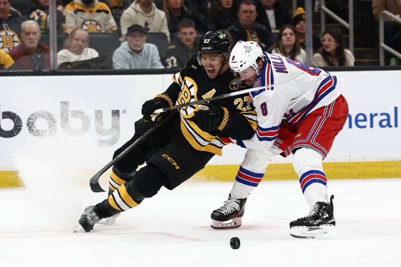 Nov 28, 2025; Boston, Massachusetts, USA; New York Rangers center J.T. Miller (8) battles with Boston Bruins defenseman Hampus Lindholm (27) for a loose puck during the second period at TD Garden. Mandatory Credit: Winslow Townson-Imagn Images