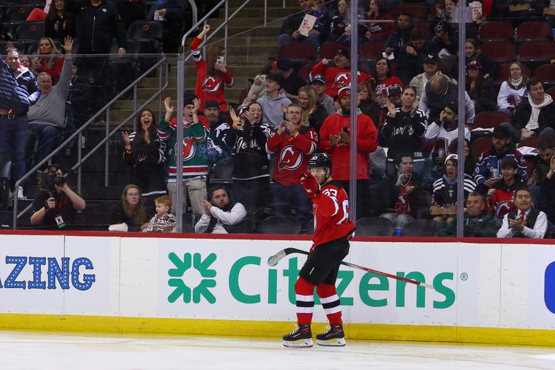 Feb 6, 2024; Newark, New Jersey, USA; New Jersey Devils left wing Jesper Bratt (63) celebrates his goal against the Colorado Avalanche during the second period at Prudential Center. Mandatory Credit: Ed Mulholland-USA TODAY Sports