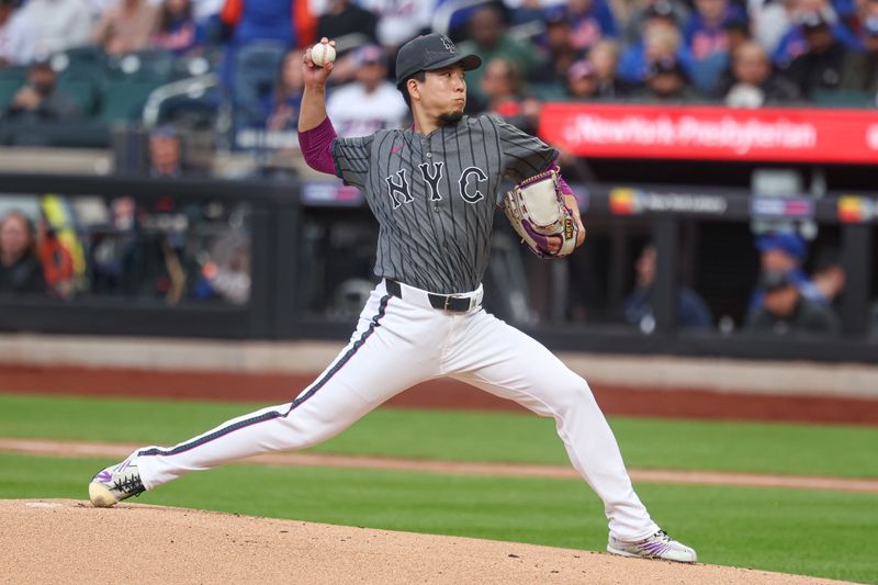 May 25, 2025; New York City, New York, USA; New York Mets starting pitcher Kodai Senga (34) delivers a pitch during the first inning against the Los Angeles Dodgers at Citi Field. Mandatory Credit: Vincent Carchietta-Imagn Images