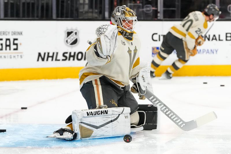 Jan 13, 2024; Las Vegas, Nevada, USA; Vegas Golden Knights goaltender Isaiah Saville (31) warms up before a game against the Calgary Flames at T-Mobile Arena. Mandatory Credit: Stephen R. Sylvanie-USA TODAY Sports