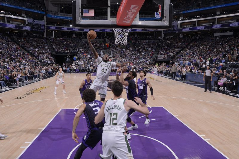 SACRAMENTO, CA - MARCH 12: Thanasis Antetokounmpo #43 of the Milwaukee Bucks drives to the basket during the game against the Sacramento Kings on March 12, 2024 at Golden 1 Center in Sacramento, California. NOTE TO USER: User expressly acknowledges and agrees that, by downloading and or using this Photograph, user is consenting to the terms and conditions of the Getty Images License Agreement. Mandatory Copyright Notice: Copyright 2024 NBAE (Photo by Rocky Widner/NBAE via Getty Images)