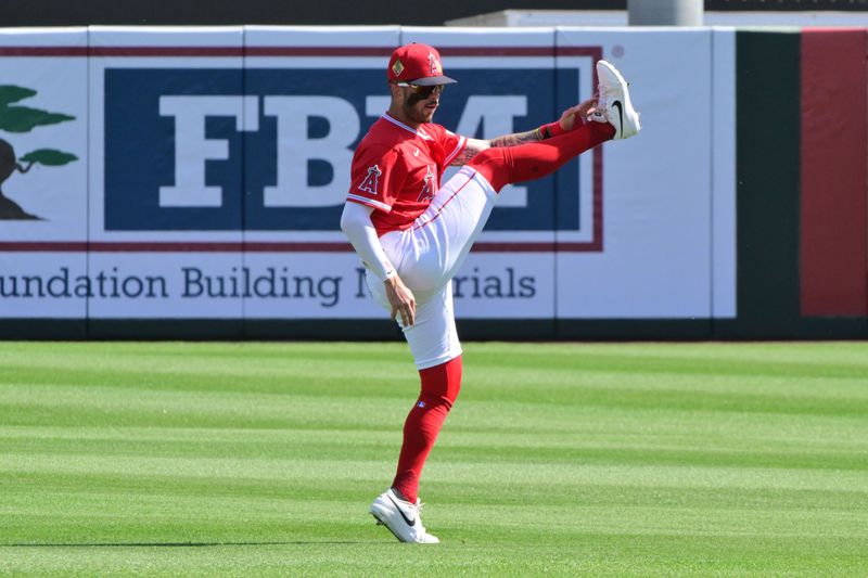 Feb 26, 2026; Tempe, Arizona, USA; Los Angeles Angels shortstop Zach Neto (9) warms up prior to the game against the Chicago Cubs at Tempe Diablo Stadium. Mandatory Credit: Matt Kartozian-Imagn Images