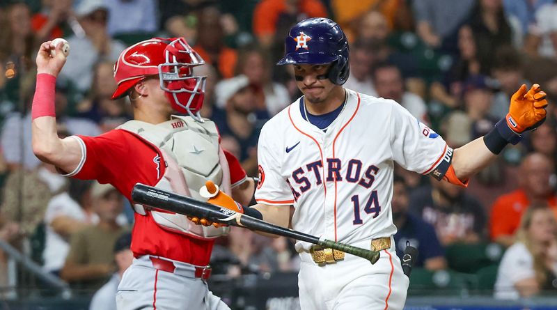 Sep 19, 2024; Houston, Texas, USA;  Houston Astros second baseman Mauricio Dubon (14) reacts after striking out leaving two men on base against the Los Angeles Angels to end the second inning  at Minute Maid Park. Mandatory Credit: Thomas Shea-Imagn Images