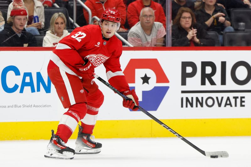 Oct 4, 2024; Detroit, Michigan, USA;  Detroit Red Wings center Marco Kasper (92) skates with the puck in the second period against the Ottawa Senators at Little Caesars Arena. Mandatory Credit: Rick Osentoski-Imagn Images