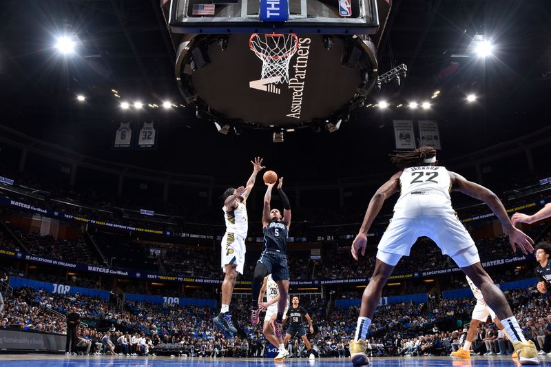 ORLANDO, FL - OCTOBER 28: Paolo Banchero #5 of the Orlando Magic shoots the ball during the game against the Indiana Pacers on October 28, 2024 at Kia Center in Orlando, Florida. NOTE TO USER: User expressly acknowledges and agrees that, by downloading and or using this photograph, User is consenting to the terms and conditions of the Getty Images License Agreement. Mandatory Copyright Notice: Copyright 2024 NBAE (Photo by Fernando Medina/NBAE via Getty Images)