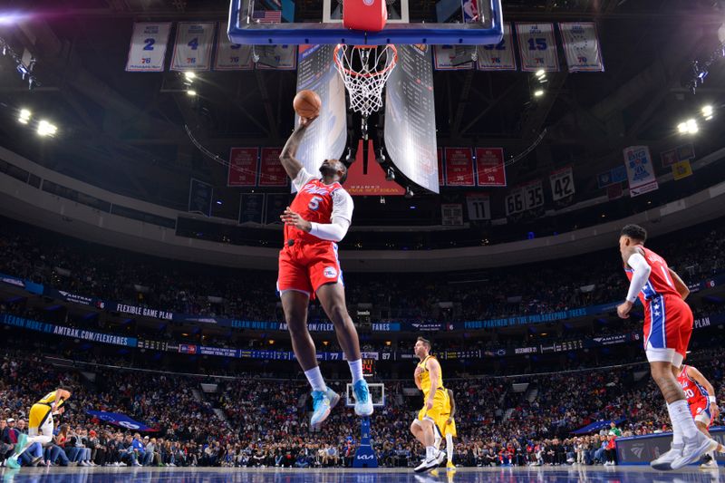 PHILADELPHIA, PA - DECEMBER 13: Andre Drummond #5 of the Philadelphia 76ers goes up for the rebound during the game against the Indiana Pacers on December 13, 2024 at the Wells Fargo Center in Philadelphia, Pennsylvania NOTE TO USER: User expressly acknowledges and agrees that, by downloading and/or using this Photograph, user is consenting to the terms and conditions of the Getty Images License Agreement. Mandatory Copyright Notice: Copyright 2024 NBAE (Photo by Jesse D. Garrabrant/NBAE via Getty Images)