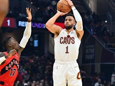 CLEVELAND, OHIO - NOVEMBER 26: Max Strus #1 of the Cleveland Cavaliers shoots over Dennis Schroder #17 of the Toronto Raptors during the first quarter at Rocket Mortgage Fieldhouse on November 26, 2023 in Cleveland, Ohio. NOTE TO USER: User expressly acknowledges and agrees that, by downloading and or using this photograph, User is consenting to the terms and conditions of the Getty Images License Agreement. (Photo by Jason Miller/Getty Images)