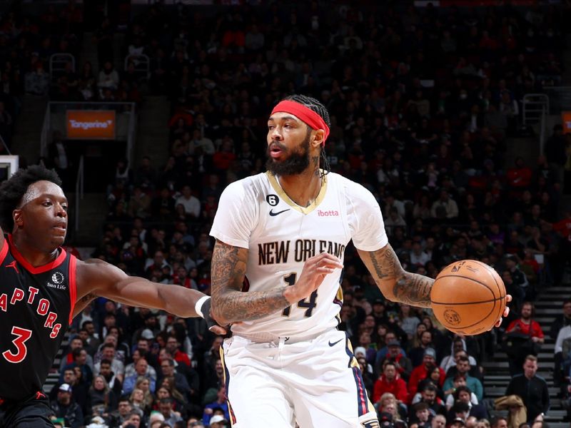 TORONTO, CANADA - FEBRUARY 23: Brandon Ingram #14 of the New Orleans Pelicans handles the ball against the Toronto Raptors on February 23, 2023 at the Scotiabank Arena in Toronto, Ontario, Canada.  NOTE TO USER: User expressly acknowledges and agrees that, by downloading and or using this Photograph, user is consenting to the terms and conditions of the Getty Images License Agreement.  Mandatory Copyright Notice: Copyright 2023 NBAE (Photo by Vaughn Ridley/NBAE via Getty Images)