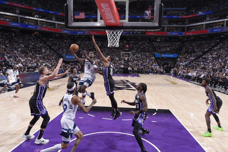 SACRAMENTO, CA - OCTOBER 24: Anthony Edwards #5 of the Minnesota Timberwolves drives to the basket during the game against the Sacramento Kings on October 24, 2024 at Golden 1 Center in Sacramento, California. NOTE TO USER: User expressly acknowledges and agrees that, by downloading and or using this Photograph, user is consenting to the terms and conditions of the Getty Images License Agreement. Mandatory Copyright Notice: Copyright 2024 NBAE (Photo by Rocky Widner/NBAE via Getty Images)