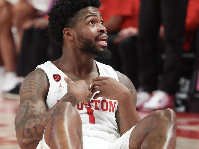 Nov 24, 2023; Houston, Texas, USA; Houston Cougars guard Jamal Shead (1) reacts to a foul called on him against the Montana Grizzlies  in the second half at Fertitta Center. Mandatory Credit: Thomas Shea-USA TODAY Sports