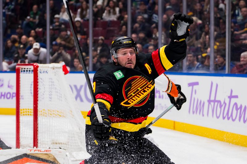 Nov 28, 2023; Vancouver, British Columbia, CAN; Vancouver Canucks forward J.T. Miller (9) reacts after catching an edge on a breakaway attempt against the Anaheim Ducks in the second period at Rogers Arena. Mandatory Credit: Bob Frid-USA TODAY Sports