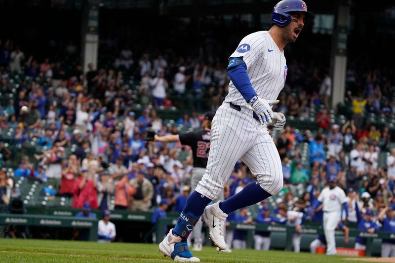Sep 22, 2024; Chicago, Illinois, USA; Chicago Cubs outfielder Mike Tauchman (40) runs the bases after hitting a home run against the Washington Nationals during the first inning at Wrigley Field. Mandatory Credit: David Banks-Imagn Images