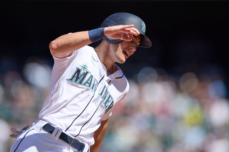 Aug 2, 2023; Seattle, Washington, USA; Seattle Mariners  Dominic Canzone rounds third on his way to score during the seventh inning against the against the Boston Red Sox at T-Mobile Park. Mandatory Credit: John Froschauer-USA TODAY Sports