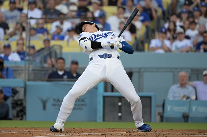 Jul 22, 2024; Los Angeles, California, USA;  Los Angeles Dodgers designated hitter Shohei Ohtani (17) backs off an inside pitch in the first inning against the San Francisco Giants at Dodger Stadium. Mandatory Credit: Jayne Kamin-Oncea-USA TODAY Sports