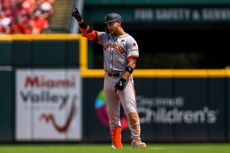 Aug 4, 2024; Cincinnati, Ohio, USA; San Francisco Giants outfielder Michael Conforto (8) reacts after hitting a two-run double in the eighth inning against the Cincinnati Reds at Great American Ball Park. Mandatory Credit: Katie Stratman-USA TODAY Sports