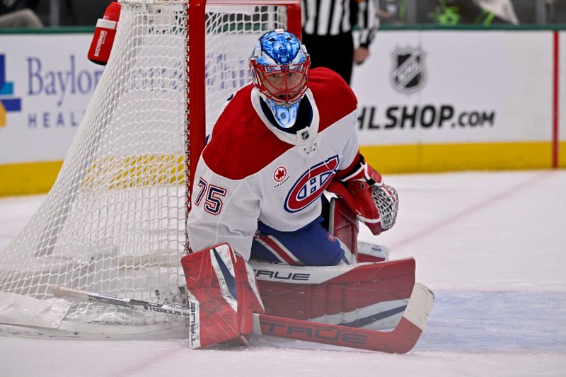 Jan 16, 2025; Dallas, Texas, USA; Montreal Canadiens goaltender Jakub Dobes (75) faces the Dallas Stars attack during the second period at the American Airlines Center. Mandatory Credit: Jerome Miron-Imagn Images