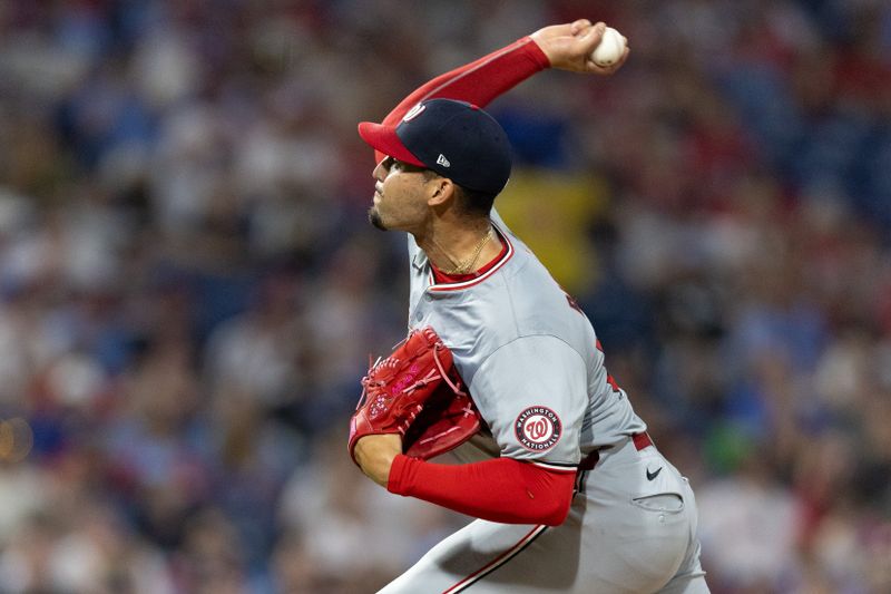 Aug 15, 2024; Philadelphia, Pennsylvania, USA; Washington Nationals pitcher Orlando Ribalta (64) throws a pitch during the eighth inning against the Philadelphia Phillies at Citizens Bank Park. Mandatory Credit: Bill Streicher-USA TODAY Sports