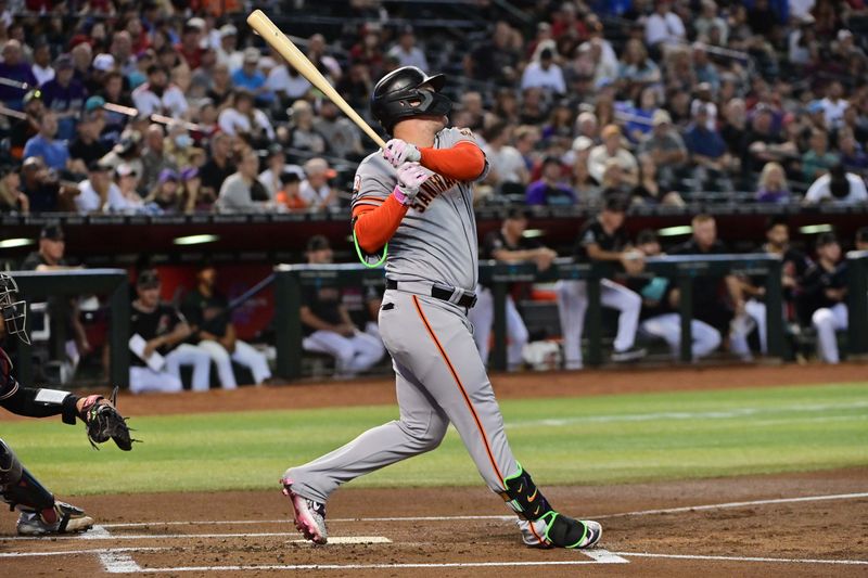 Sep 19, 2023; Phoenix, Arizona, USA; San Francisco Giants designated hitter Joc Pederson (23) hits a solo home run in the first inning against the Arizona Diamondbacks at Chase Field. Mandatory Credit: Matt Kartozian-USA TODAY Sports