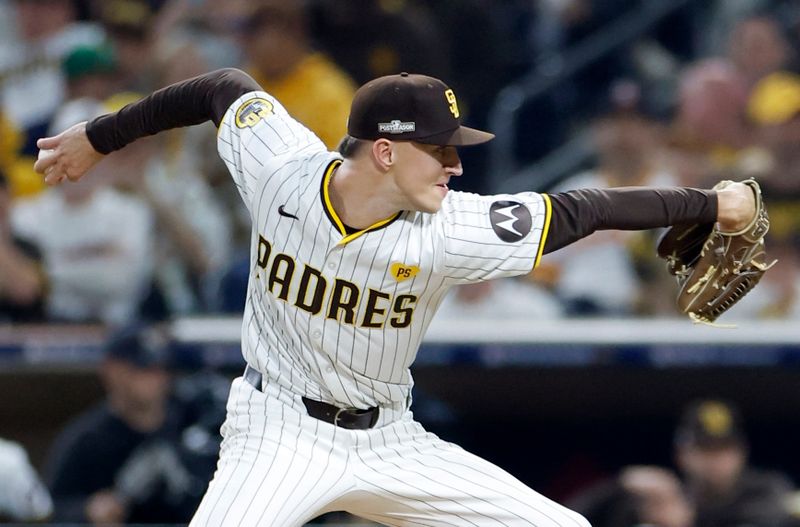 Oct 9, 2024; San Diego, California, USA; San Diego Padres pitcher Alek Jacob (37) throws in the seventh inning against the Los Angeles Dodgers during game four of the NLDS for the 2024 MLB Playoffs at Petco Park. Mandatory Credit: David Frerker-Imagn Images