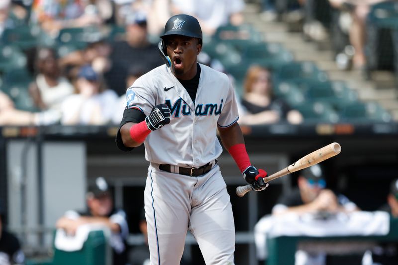 Jun 10, 2023; Chicago, Illinois, USA; Miami Marlins right fielder Jesus Sanchez (7) reacts after a walk with the bases loaded against the Chicago White Sox during the ninth inning at Guaranteed Rate Field. Mandatory Credit: Kamil Krzaczynski-USA TODAY Sports