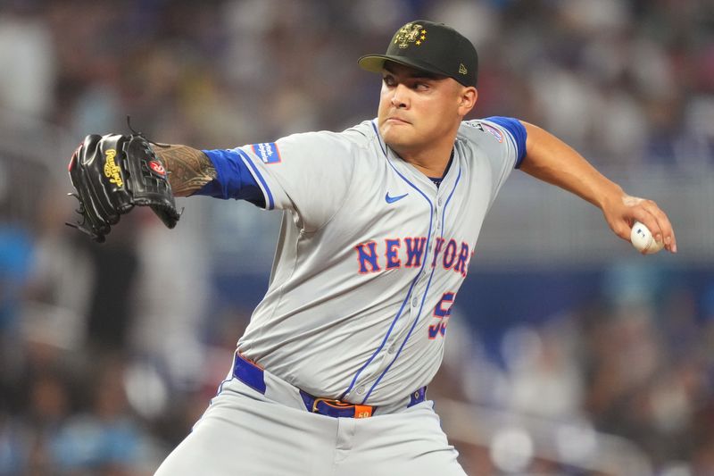 May 19, 2024; Miami, Florida, USA;  New York Mets pitcher Sean Manaea (59) pitches in the first inning against the Miami Marlins at loanDepot Park. Mandatory Credit: Jim Rassol-USA TODAY Sports