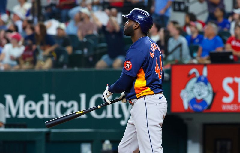 Aug 6, 2024; Arlington, Texas, USA; Houston Astros left fielder Yordan Alvarez (44) hits a two-run home run during the ninth inning against the Texas Rangers at Globe Life Field. Mandatory Credit: Kevin Jairaj-USA TODAY Sports