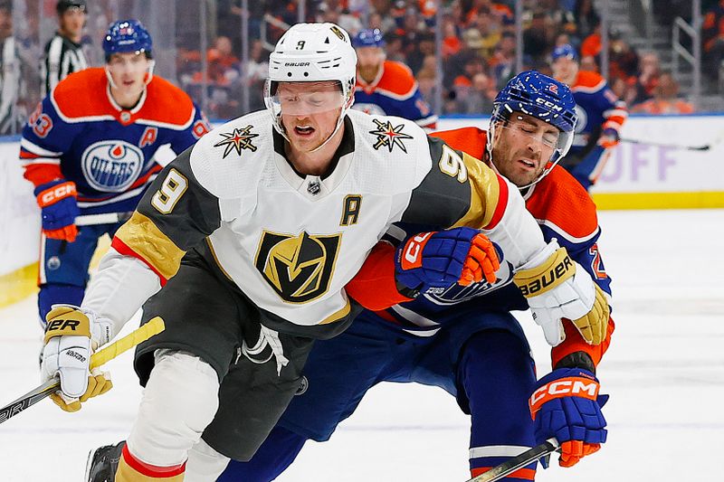 Nov 28, 2023; Edmonton, Alberta, CAN; Vegas Golden Knights forward Jack Eichel (9) and Edmonton Oilers defensemen Evan Bouchard (2) battle for positiopn during the second period at Rogers Place. Mandatory Credit: Perry Nelson-USA TODAY Sports