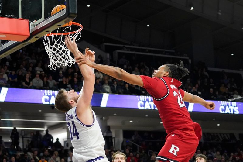 Jan 29, 2025; Evanston, Illinois, USA; Rutgers Scarlet Knights center Lathan Sommerville (24) defends Northwestern Wildcats center Matthew Nicholson (34) during the second half at Welsh-Ryan Arena. Mandatory Credit: David Banks-Imagn Images