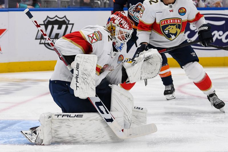 Dec 23, 2022; Elmont, New York, USA;  Florida Panthers goaltender Sergei Bobrovsky (72) makes a save against the New York Islanders during the second period at UBS Arena. Mandatory Credit: Dennis Schneidler-USA TODAY Sports