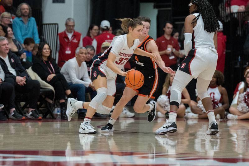 Jan 27, 2023; Stanford, California, USA; Stanford Cardinal guard Hannah Jump (33) dribbles the basketball against Oregon State Beavers guard Noelle Mannen (4) during the fourth quarter at Maples Pavilion. Mandatory Credit: Neville E. Guard-USA TODAY Sports