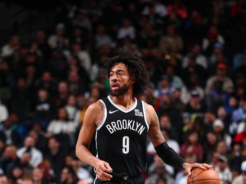 BROOKLYN, NY - DECEMBER 8: Trendon Watford #9 of the Brooklyn Nets dribbles the ball during the game against the Milwaukee Bucks on December 8, 2024 at Barclays Center in Brooklyn, New York. NOTE TO USER: User expressly acknowledges and agrees that, by downloading and or using this Photograph, user is consenting to the terms and conditions of the Getty Images License Agreement. Mandatory Copyright Notice: Copyright 2024 NBAE (David L. Nemec/NBAE via Getty Images)