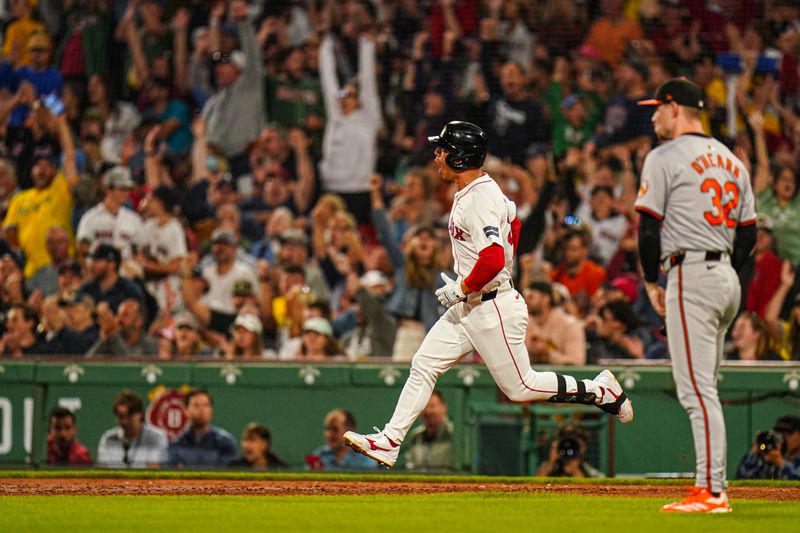 Sep 9, 2024; Boston, Massachusetts, USA; Boston Red Sox right fielder Rob Refsnyder (30) hits a two run home run against the Baltimore Orioles in the third inning at Fenway Park. Mandatory Credit: David Butler II-Imagn Images