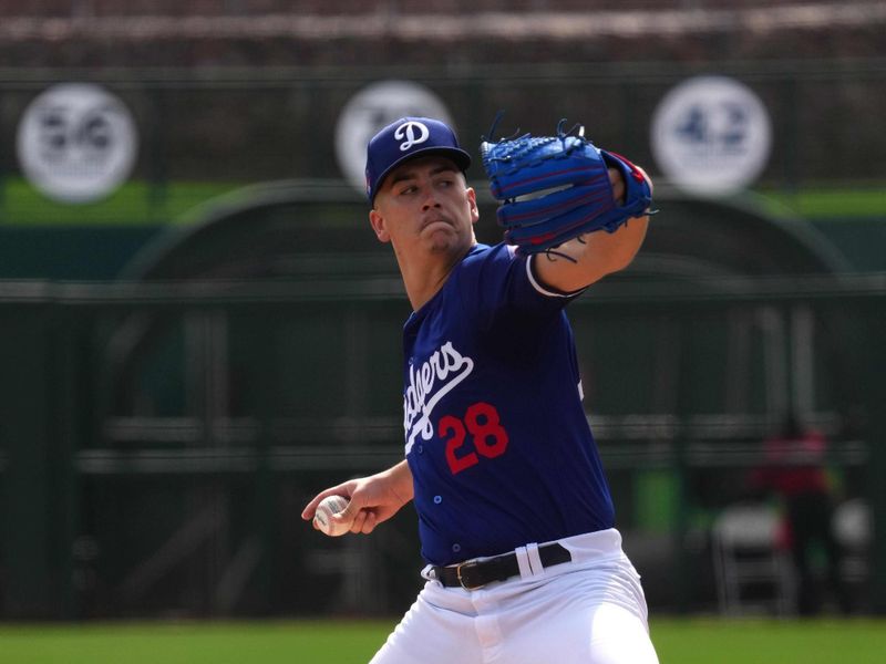 Feb 27, 2024; Phoenix, Arizona, USA; Los Angeles Dodgers starting pitcher Bobby Miller (28) pitches against the Chicago White Sox during the first inning at Camelback Ranch-Glendale. Mandatory Credit: Joe Camporeale-USA TODAY Sports