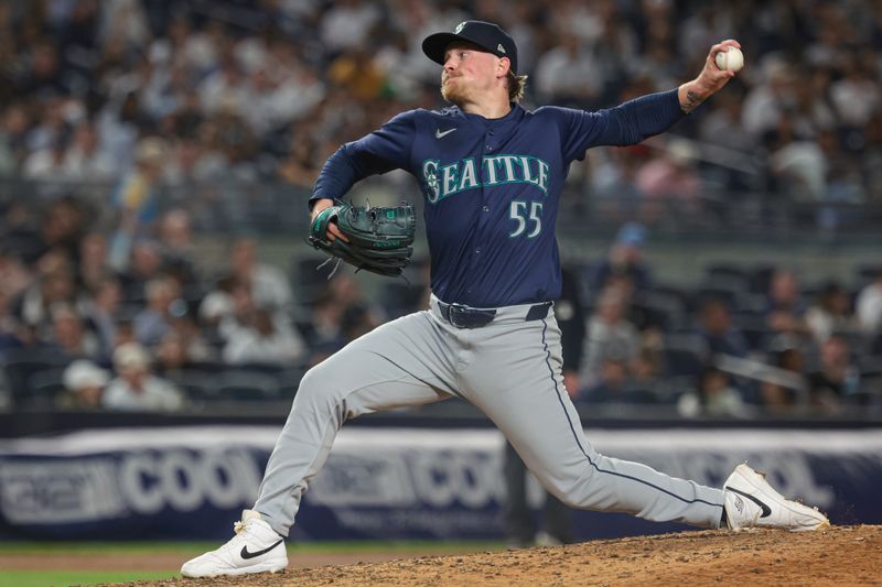 May 21, 2024; Bronx, New York, USA; Seattle Mariners relief pitcher Gabe Speier (55) delivers a pitch during the seventh inning against the New York Yankees at Yankee Stadium. Mandatory Credit: Vincent Carchietta-USA TODAY Sports