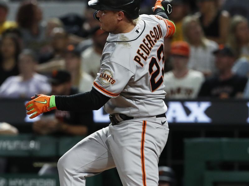 Jul 15, 2023; Pittsburgh, Pennsylvania, USA;  San Francisco Giants designated hitter Joc Pederson (23) hits a single against the Pittsburgh Pirates during the eighth inning at PNC Park. Mandatory Credit: Charles LeClaire-USA TODAY Sports