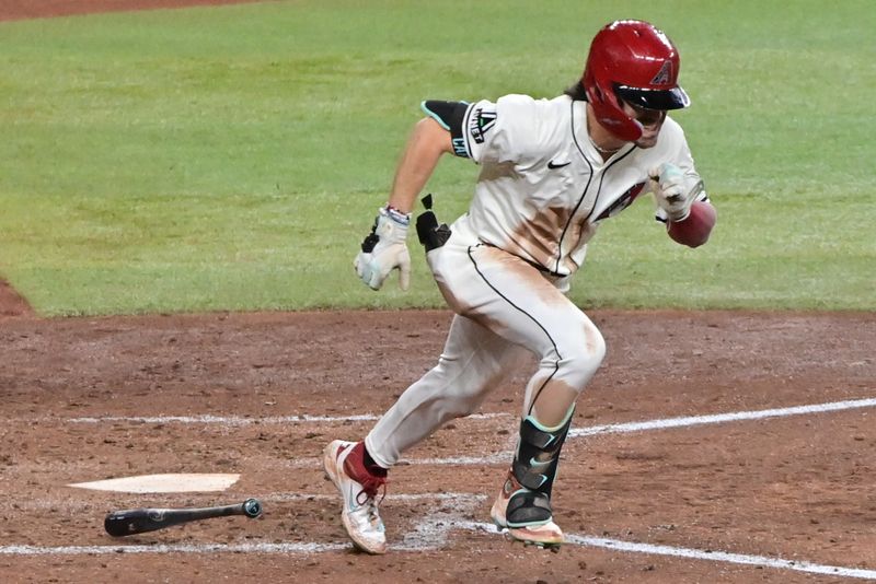 Sep 25, 2024; Phoenix, Arizona, USA; Arizona Diamondbacks outfielder Corbin Carroll (7) singles in the sixth inning against the San Francisco Giants at Chase Field. Mandatory Credit: Matt Kartozian-Imagn Images